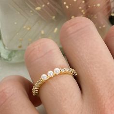 "Beautiful, 14k gold plated, dainty pearl purity ring. \"Blessed are the pure in heart...\" Matthew 5:8 <3 * Made of 925 Sterling Silver * THICK plating of 14k Gold All sales are Final Sale on all Purity Rings, so make sure you know your correct measurements + ring size! :)" Dainty Pearl Stackable Rings For Anniversary, Gold Pearl Promise Ring In 14k Gold, Dainty Adjustable Yellow Gold Pearl Ring, Adjustable Dainty Yellow Gold Pearl Ring, Adjustable Dainty Pearl Ring For Anniversary, Dainty Adjustable Pearl Ring For Anniversary, Gold Stackable Pearl Ring For Anniversary, Elegant Hypoallergenic Pearl Promise Ring, Dainty Pearl Birthstone Ring For Anniversary