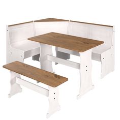 the corner table and benches are white with wood accents on each side, as well as brown trim