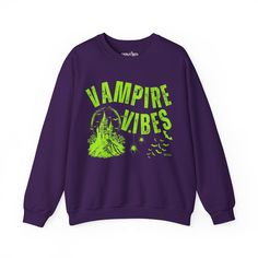 Sink your teeth into Halloween fashion with the Eddy and Rita Women's Heavy Crewneck Sweatshirt featuring the phrase "Vampire Vibes" in a spooky, stylish design. This heavyweight sweatshirt provides maximum warmth and comfort, making it perfect for those crisp autumn nights. With its relaxed fit, this sweatshirt is ideal for layering over your favorite Halloween ensemble or wearing solo for a cozy night in. Whether you're hitting a Halloween party, trick-or-treating, or just enjoying the season, Horror Style Long Sleeve Tops For Streetwear, Punk Halloween Sweatshirt With Graphic Print, Gothic Halloween Graphic Sweatshirt, Punk Style Halloween Sweatshirt With Graphic Print, Punk Halloween Sweatshirt With Letter Print, Vampire Vibes, Crisp Autumn, Halloween Graphic, Autumn Night