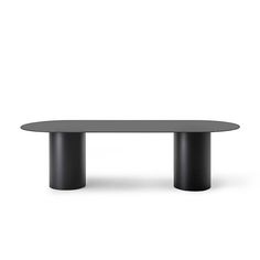 an oval table with two black legs