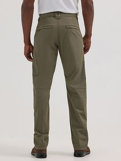 ON THE MOVE IN STYLE This pant will get you there in complete comfort. It’s crafted from a high-performance blend with cotton and just the right amount of stretch to give you full freedom of movement. These travel pants are designed to wick moisture away, so you stay cool and dry no matter what the forecast has in store. They also come with built-in UV protection to shield you from the sun’s harmful rays. A straight fit makes them stylish enough for week and weekend wear no matter what’s on your Men's Affordable Outdoor Work Pants, Functional Moisture-wicking Cargo Pants For Outdoor, Outdoor Nylon Cargo Pants With Moisture-wicking, Military Pants With Patch Pockets For Outdoor, Wrangler Pants, Military Nylon Outdoor Pants, Chino Pants Men, Travel Pants, Weekend Wear