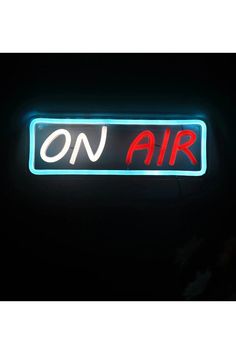 an on air neon sign in the dark