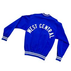 a blue sweatshirt with the words west central printed on it and white writing across the chest