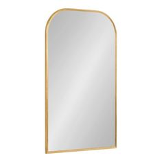 a gold framed mirror on a white wall with an arch shaped design in the middle