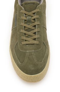 Take your casual style up a notch with this low-top suede sneaker featuring matching laces for a monochrome look. Lace-up style Leather upper/recycled-polyester lining/rubber sole Imported Suede Sneakers With Elastic Laces, Casual Suede Sneakers For Sports, Casual Suede Sneakers, Casual High-top Sneakers With Gum Sole, Casual Suede High-top Sneakers With Rubber Sole, Suede High-top Lace-up Sneakers, Casual Green Sneakers With Suede Lining, Casual Suede High-top Sneakers, Casual Suede High-top Sneakers With Vulcanized Sole