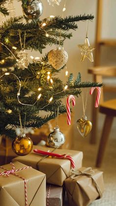 a christmas tree with presents under it