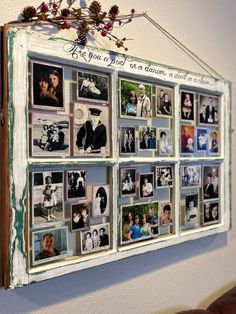 a wall hanging with many pictures on it