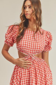 Short sleeve gingham plaid ruffle detail side cut out and open back mini dress with lining. poly/rayon Short Sleeve Mini Dress With Ruffles For Picnic, Fitted Ruffle Hem Mini Dress For Picnic, Fitted Plaid Mini Dress For Brunch, Fitted Mini Dress With Ruffle Hem For Picnic, Gingham Mini Dress With Short Sleeves For Brunch, Short Sleeve Gingham Mini Dress For Brunch, Chic Plaid Dress With Ruffles For Spring, Summer Plaid Dress With Ruffle Hem For Picnic, Ruffled Mini Length Plaid Dress For Day Out