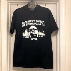 a black t - shirt with the words brooklyn's finest, the infamous blg