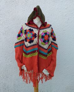 MANDALA BREEZE Hooded Colorful Fringed Cardigan, Boho Chic, Multicolored Crochet, Orange Hippy Tunic, Bohemian Crochet, Hippie by Papicca on Etsy One Size Cozy Outerwear For Festivals, Cozy One Size Outerwear For Festivals, One Size Bohemian Knit Cardigan, One Size Bohemian Sweater, Traditional Multicolor Cardigan For Fall, Casual Knitted Sweater For Festival, Hippie Cotton Cardigan For Fall, Bohemian Knit Cardigan, Bohemian Yarn Outerwear For Fall