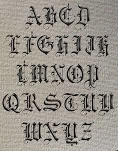 an old fashioned font that has been made into some type of paper