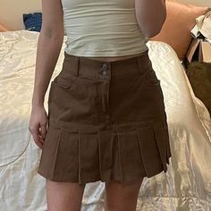 In Brown Size Xsmall Measurements Flat: Waist 12”, Length 14” Denim Mix, Pleated Hem, High Waisted Nwt Condition