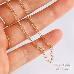 This gold paperclip chain necklace will be your new go-to necklace! We love to wear this minimalist necklace with other necklaces to layer or alone as a statement necklace! You can also wear it as a choker necklace in a shorter length. Gold filled necklace Nickel-free Choose from 2 styles of chains Small Link Chain: Link Size - 2.5 x 6 mm Spring ring Large Link Chain: Link Size - 3.7 x 13.2 mm Lobster claw No jump ring attached Minimalist Everyday Cable Chain Necklace, Everyday Minimalist Cable Chain Necklace, Minimalist Jewelry With Rectangular Link Clavicle Chain, Minimalist Clavicle Chain Jewelry With Rectangular Links, Simple Everyday Paperclip Chain Jewelry, Simple Link Chain Jewelry, Cable Chain Link Charm Necklace, Everyday Cable Chain Link Charm Necklace, Delicate Everyday Paperclip Bracelet