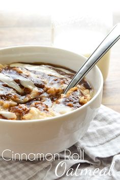 a bowl of cinnamon roll oatmeal on a napkin with a spoon in it