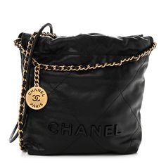 This is an authentic CHANEL Shiny Caviar Quilted Monochrome Mini Chanel 22 in Black. This chic bag is crafted smooth calfskin diamond-stitched leather in black. The bag features a leather threaded aged gold chain link shoulder strap joined to a thin rolled leather strap, a leather threaded chain link handle, an aged gold medallion, and the Chanel logo in black. The bag opens to a black diamond quilted fabric interior with a flat pocket. Mini Chanel, Chanel 22, Chanel Print, Classic Phones, Chanel Crossbody, Chanel Tweed, Denim Quilt, Chanel Shoulder Bag, Gold Medallion