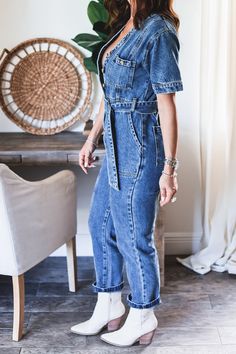 Give me all the denim vibes in the Arrie Denim Jumpsuit. The short sleeve dark wash denim jumpsuit it a closet must have. This classic button up denim jumpsuit with a attached belt. This Denim jumpsuit is a true denim fit with no stretch. No zipper closure. Front chest pocket. When button up the neckline is a V-neck. Ankle cut Jumpsuit. Style with your fav booties <3 Model is wearing a size Small. She is 5'6". 130lbs. Bust: 34" Waist 26" Hips 36" Jumpsuit Style, Denim Jumpsuit, Dark Wash Denim, Pet Hair, Chest Pocket, Must Haves, Give It To Me, Button Up, Jumpsuit