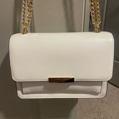 Michael Kors White Leather Purse With Gold Chain Strap. Brand New With Tags Cute White Purse, White And Gold Purse, White Chain Bag For Formal Occasions, White Formal Bag With Chain Strap, White Chain Strap Bag For Office, White Office Bags With Chain Strap, Formal White Chain Bag, Classic White Bag With Chain, Classic White Shoulder Bag With Chain Strap