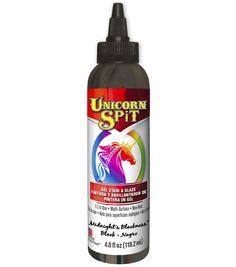 the bottle of unicorn spit is shown on a white background with an image of a horse's head