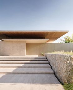 an outdoor area with steps leading up to the roof