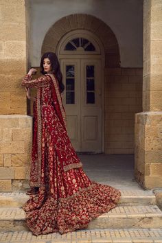 Traditional Red Bridal Lehenga and Kameez Pakistani Wedding Dress is beautifully adorned with goldwork, intricate designs, and embellishments. Premium quality fabric and perfect stitching of this Pakistani Bridal Outfit make it your priority to have a head-turning wedding look. Burgundy Pakistani Bridal, Dark Red Wedding Lehenga, New Bridal Dresses Pakistani, Red Wedding Dress Pakistani, Baraat Dress Pakistani Bridal Wear, Farshi Lehenga, Red Bridal Lehenga Pakistani, Red Pakistani Bridal Dress, Fashion Career Aesthetic