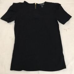 Never Worn. Puff Sleeves. Gold Zipper On Back. Excellent Condition. No Stain Or Tear. Forever 21 Trendy Black Blouse, Forever 21 Black Fitted Blouse, Forever 21 Black Short Sleeve Top, Trendy Black Blouse From Forever 21, Trendy Black Blouse Forever 21, Fitted Black Blouse By Forever 21, Forever 21 Elegant Black Top, Chic Black Blouse From Forever 21, Forever 21 Black Blouse For Night Out