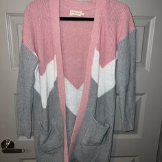 White, Pink, Grey Cardigan. Never Worn. Still Has Tag On It. Cozy Pink V-neck Outerwear, Trendy Pink V-neck Outerwear, Cute Pink V-neck Outerwear, Pink V-neck Trendy Outerwear, Pink Casual V-neck Cardigan, Pink Sweater For Spring Layering, Cozy Pink Cardigan For Layering, Pink Knit Cardigan For Layering, Pink Knit Cardigan For Casual Wear