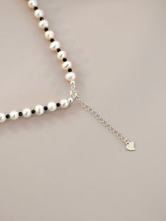 Product Introduction: Size: pearl size: 5-6mm flawless oval bead/7-8mm baroque; Necklace length: 43cm+4cm extension chain Material: pearl: natural freshwater pearl; Material: full-body 925 pure Pearl classification: freshwater pearl Pearl shape: abnormal Color: 5-6mm oval bead, 7-8mm baroque Packing list: 1* Necklace Color Perla, Baroque Necklace, Black Spinel Necklace, Spinel Necklace, European Women, Sweater Chain, Black Spinel, Pearl Size, Dress Size Chart