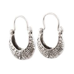 Resembling cradles these hoop earrings from India are created by Bhavya Jain. She crafts each crescent-shaped earring from sterling silver detailed with a lovely array of patterns that are treated with a combination of finishes. Crescent Jewelry With Intricate Design, Traditional Small Hoop Sterling Silver Earrings, Traditional Sterling Silver Hoop Earrings With Ear Wire, Ornate Sterling Silver Hoop Earrings With Intricate Design, Sterling Silver Hoop Jewelry With Intricate Design, Elegant Crescent Jewelry With Oxidized Finish, Elegant Crescent Oxidized Jewelry, Semi-circle Sterling Silver Earrings Gift, Sterling Silver Semi-circle Earrings Gift