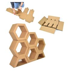 cardboard boxes are stacked on top of each other to make hexagonal structures that look like hexagons