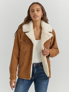 When cold weather comes, you won't want to get caught out and about without our Women’s Western Sherpa-Lined Corduroy Wrange Coat. Reimagined in the perfect texture for changing seasons, this jacket is crafted from cotton and lined with sherpa all the way up to the notched collar for extra warmth. It comes with angled hand pockets, chest pockets with the signature “W” stitching, and a full button closure for easy layering. Western Autumn Outfits, Western Capsule Wardrobe, Western Women Outfits, Colorado Cowgirl, Western Jacket Women, Carhartt Jacket Women's, Rodeo Fits, Guy Styles, Western Fall Outfits