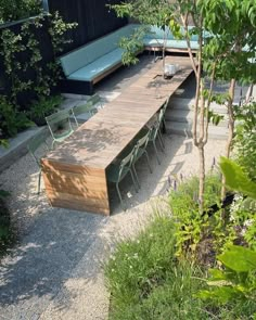 an outdoor seating area with benches and tables