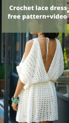 a woman wearing a white crochet dress