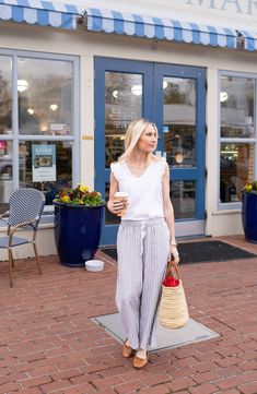 Breezy stripes adorn these lightweight linen-blend pants cut with flowy wide legs and topped with a comfortable elastic waist. 24 1/2" inseam; 25" leg opening; 11 1/2" front rise; 15 1/2" back rise (size Medium) Elastic/drawstring waist Front slant pockets; back welt pockets 55% linen, 45% rayon Machine wash, tumble dry Imported Chic Striped Wide Leg Pants For Vacation, Chic Striped Wide Leg Pants For Beach, Casual Striped Wide Leg Pants For Vacation, Spring Striped Wide Leg Pants With Relaxed Fit, Casual Striped Wide Leg Pants For Spring, Striped Linen Bottoms For Spring, Chic Striped Linen Bottoms, Striped Pants For Spring Vacation, Striped Wide Leg Pants For Summer Beach