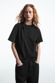 TWIST-NECK T-SHIRT - BLACK - T-shirts - COS Relaxed Fit Crew Neck Short Sleeve Top For Work, Modern Short Sleeve Tops For Casual Gatherings, Relaxed Fit Crew Neck Top For Work, Modern Relaxed Fit Top For Casual Gatherings, Modern Tops For Workwear With Relaxed Fit, Modern Short Sleeve Workwear T-shirt, Knitted Tshirt, Women Style, T Shirt Dress