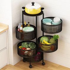 three tiered basket on wheels in the corner of a kitchen