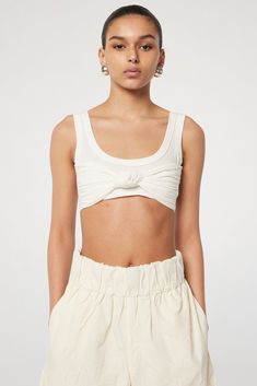 Inessa Top - White | The Line by K Versatile Seamless Summer Crop Top, Versatile Triangle Top For Spring, Fitted Twist Front Tops For Summer, Chic Beach Tops Bra Friendly, Chic Summer Top With Twist Front, The Line By K, Versatile Twist Front Top For Summer, Summer Fitted Twist Front Tops, Chic Summer Tops With Seamless Construction