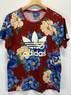 Womens Red Floral Graphic Adidas Trefoil Tshirt Sz S VGUC Active Workout. Floral Print Crew Neck Top For Streetwear, Red Sports T-shirt For Spring, Red Cotton Top With All Over Print, Red Graphic Tee With All Over Print, Red Sports Top With All Over Print, Spring Red T-shirt With Logo Print, Adidas Red Short Sleeve Top, Red Printed T-shirt For Streetwear, Red Cotton Printed T-shirt