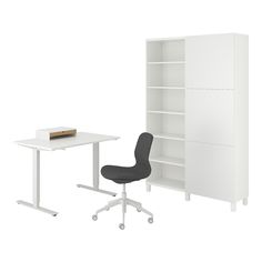 an office desk with a bookcase and chair next to it, in front of a white bookshelf