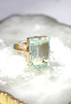 Aquamarine Crystal Ring Emerald Cut Swarovski Ring | Etsy Aquamarine Topaz Wedding Ring, Elegant Aquamarine Birthstone Crystal Ring, Wedding Jewelry: Emerald Cut Topaz, Wedding Jewelry With Emerald Cut Topaz, Emerald Cut Topaz Jewelry For Weddings, Emerald Cut Topaz Wedding Jewelry, Aquamarine Gemstone Rings For Wedding, Aquamarine Gemstone Wedding Rings, Aquamarine Crystal Ring With Prong Setting For Wedding