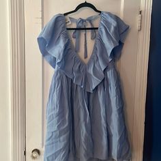 This One Is (I Believe) From The Marshall’s Junior / Cube Section. It Is So Cute, Just A Little Short If You’re A Tall Gal Like Me (I’m 5’10 And It Was A Little Too Babydoll-Ish). Never Worn, Tried On Once Blue V-neck Mini Dress With Tie Back, Light Blue Tie Back Mini Dress For Beach, Flirty Flowy Blue Mini Dress, Blue Tie Back Dress For Day Out, Light Blue Tie Back Mini Dress For Spring, Light Blue Tie Back Summer Dress, Light Blue Summer Sundress For Brunch, Flirty Blue Sundress For Spring, Light Blue Summer Dress With Tie Back