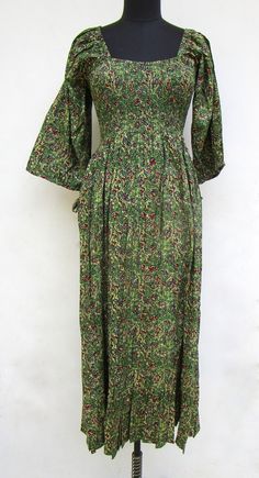 "ITEM DESCRIPTION rayon printed long maxi dress - square neckline with smocked maxi dress - 3/4th sleeve with ties maxi dress Features: Long sleeve, V neck, Long dress Material: rayon crepe Fabric: 100% rayon soft light weight ethnic print fabrics  Sleeve Length = 22 inch For more sizes & their measurement, please refer our below chart to understand the sizes variations available with us For your size requirement, please mention your size in seller note at the time of buying. SIZE MEASUREMENT  BUSTLENGTHSHOULDER XXS34 inch51 inch13.5 inch XS36 inch51 inch14 inch S38 inch51 inch14.5 inch M40 inch51 inch15 inch L42 inch51 inch16 inch XL44 inch51 inch16.5 inch 2XL46 inch51 inch17 inch 3XL48 inch51 inch18 inch   Company Return Policy:  Please write for more information to my email directly CHO Green Maxi Dress With Gathered Sleeves, Printed Square Neck Maxi Dress For Vacation, Printed Square Neck Maxi Dress For Spring, Spring Printed Maxi Dress With Square Neck, Bohemian Ruched Maxi Dress For Garden Party, Printed Square Neck Maxi Dress For Beach, Floral Print Square Neck Maxi Dress For Daywear, Square Neck Printed Maxi Dress For Beach, Flowy Bohemian Maxi Dress With Smocked Cuffs