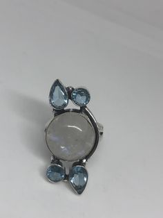 Large Vintage ring set with huge Rainbow Moonstone with Aquamarine Low content silver not sterling About an in long Size 6 can be resized at my jeweler for a $10-$20 fee All rings are shipped free in the US in a nice gift box. Check out our over a THOUSAND great reviews Engraving is $4 per letter and is not always perfect depending on the piece. It can take a few days if the jeweler is busy. This is payable to Paypal Judithsltd@gmail.com Blue Topaz Natural Stone Ring, Moonstone Ring With Large Round Stone, Unique Large Stone Moonstone Ring, Unique Round Moonstone Ring With Large Stone, Blue Topaz Ring With Natural Stones, Blue Topaz Rings With Natural Stones, Unique Blue Moonstone Ring, Blue Moonstone Ring With Natural Stones, Blue Moonstone Rings With Natural Stones