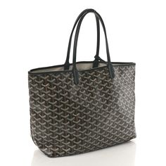 This is an authentic GOYARD Goyardine Saint Louis PM in Black. This stylish tote is crafted of Goyardine coated canvas in black with leather trim and straps. The top is open to a linen interior with a matching removable pouch. Linen Interior, Saint Louis, Leather Trim, St Louis, Leather Trims, The Top, Pouch, Trim, Canvas