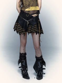 Elevate your alternative style with our Gothic black plaid punk rock handkerchief hem skirt. This unique skirt features a striking black plaid pattern that exudes a bold and edgy vibe. The handkerchief hem adds a touch of drama and movement to your look, making it perfect for expressing your individuality.  Crafted from high-quality materials, this skirt is designed to make a statement and stand the test of time. The punk rock-inspired design adds a rebellious touch to your wardrobe, making it a No Romance, Handkerchief Hem Skirt, Dark Rock, Unique Skirt, Unique Skirts, Alternative Style, Retro Punk, Patchwork Skirt, Style Punk