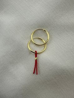 Hello, Welcome to my store ✨ If you have any questions, please contact me, i will be very happy to help you. You may want to take a look this important informations below ! ✨Earring inner diameter is 1.6cm. It contains red string amulet, this is removable so you can use with any of your chains, bracelets, earrings. ✨Mimimal collection materials are 925K good quality silver & natural gemstones & Glass Beads and very good quality rope.  ✨Important I used a special and expensive gold plated for this collection; this prevents tarnishing your silver.    ✨If you cannot find the size you are looking for, you can write to me even for your special orders; but please keep in mind; this may exceed the normal delivery time. ✨Parcels are delivered within max 2-7 days. If you need faster (1-4 days), ple Silver Hoop Earring, String Earrings, Jewelry Chest, Red String, Luck Charm, Luck Charms, Types Of Bag, Jewelry Silver, Jewelry Earrings Hoops