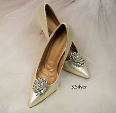 "--Silver crystal Shoe Clips, Bridal shoes Clips, Jewelry Decorations Shoe Clips,Wedding Shoes Clips,Rhinestone shoe jewelry-- This stunning silver rhinestone shoes clips is the perfect accessory for a party . This shoes clips is made from an clear rhinestone covered silver plated applique. Shoes Clips- Set of 2 Size: #3. silver- Appox 1.5-2\" #4 silver -Appox 2-1.5\" #AB silver -Appox 2\"" Silver Rhinestone Shoe Clips, Silver Rhinestone Wedding Shoes, Silver Wedding Shoes With Rhinestones, Silver Rhinestone Shoe Clips For Evening, Evening Silver Rhinestone Shoe Clips, Elegant Silver Wedding Shoes With Bling, Silver Bling Wedding Shoes, Gold Rhinestone Shoe Clips For Wedding, Shoes Clips