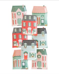 six paper houses are stacked on top of each other