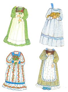 four children's dresses with different patterns and sizes, including one for the doll