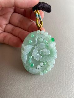 🌈 Flower and Butterfly Jadeite Jade Pendant, Light Green 🌷 Untreated Natural Jadeite/ Grade A Jade 🌷 Certified : YES 🌷 Jade from Myanmar/ Burma 🌷 Dimensions : 48 x 37.8 x 11mm 🌷 Color : Light Green 🌷 Free standard shipping from Hong Kong with tracking provided 🌷 Take approximately 7-21 days to arrive worldwide Handmade Jade Necklace For Wedding, Exquisite Handmade Green Jewelry, Green Oval Carved Necklace, Oval Jade Necklaces For Wedding, Flower And Butterfly, Lavender Green, Light Copper, Jade Bangle, Gemstones Jewelry