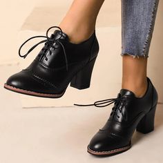 Step back in time with these Black Vintage Oxford Heels. Featuring a lace-up design and wingtip detailing, these women's shoes combine classic style with modern comfort. Color: Black Heel Type: Chunky heel Heel height: 3.15" / 80 mm approx Product measurements were taken using size 8. Please note that measurements may vary by size. Toe: Closed toe Handcrafted US sizing. Fits true to size. Wingtip Shoes Women, Color Block Heels, Black Leather Oxfords, Wingtip Shoes, Chunky Heel Ankle Boots, Chunky Heel Shoes, Oxford Heels, Black Loafers, Comfortable Heels